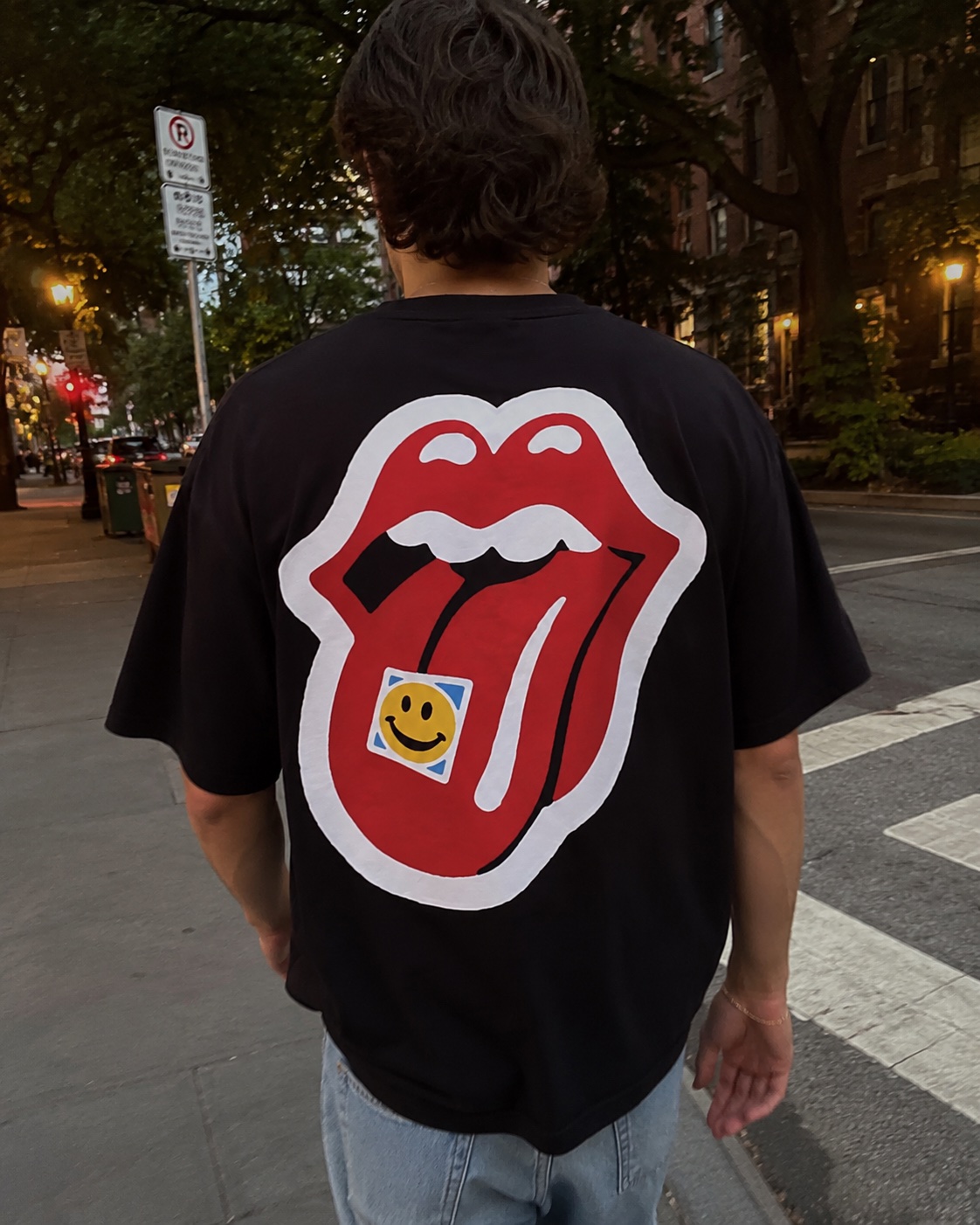 Acid Tongue tee in black, worn on the street
